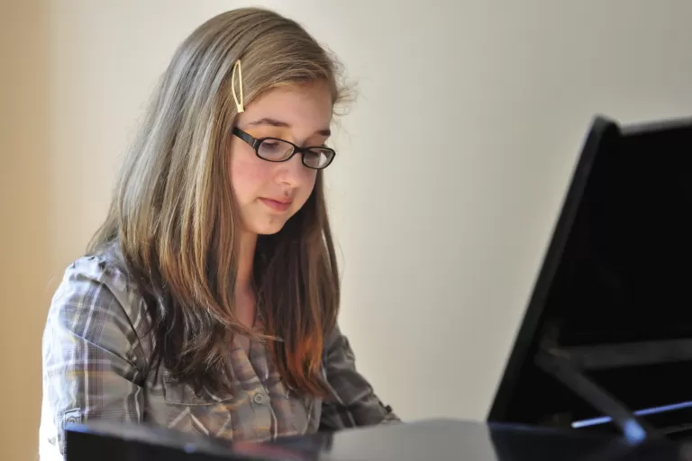 Young Woman on Piano