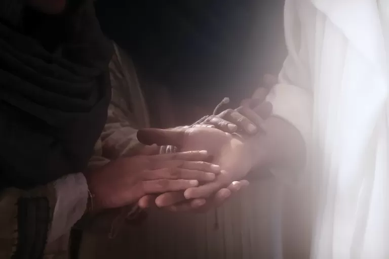 The resurrected Christ invites others to feel His hands.